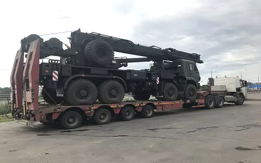 перевозка дорожной спецтехники фото