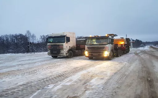 услуги перевозки спецтехники фото