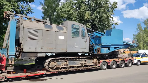 перевозка тяжелой строительной техники фото